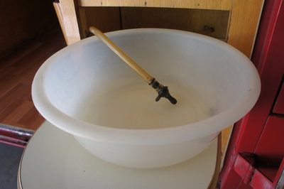 Close Up of Sink Bowl with Hose and &quot;Faucet&quot;