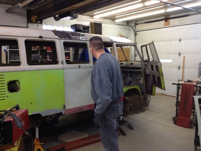 After doing some adjustment of the door hinges Bruce checks for alignment.