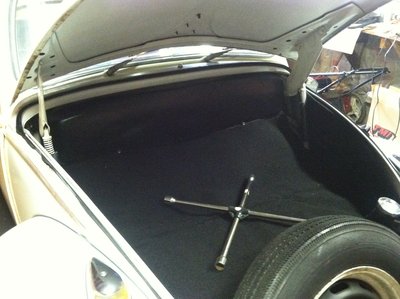 New seal around the hood and new carpet to replace the hard cardboard.