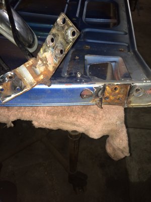 Drilled out the 3 rivets that hold the hinge on and got the whole hinge off.