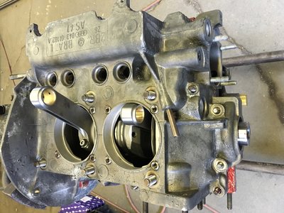 Apply sealant and mate the cases.