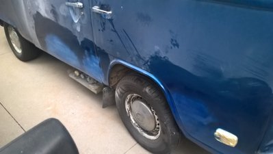 The end result: the sides look infinitely better, but because of the color mismatch, the bus is still ratty, just on another level. Win.