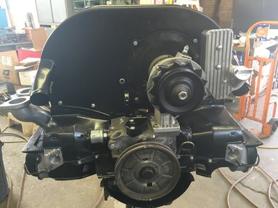 Fan and alternator, and breather/fill tower installed